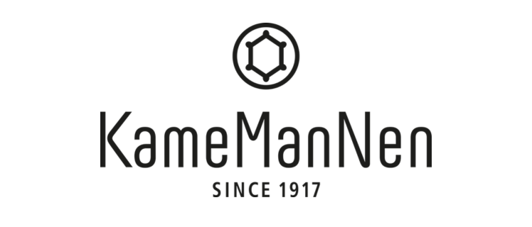 Logo of KameManNen featuring the brand name in a modern font. Above the text is a hexagonal icon that resembles a turtle shell pattern. Below the name, it reads "Since 1917." The background is white.